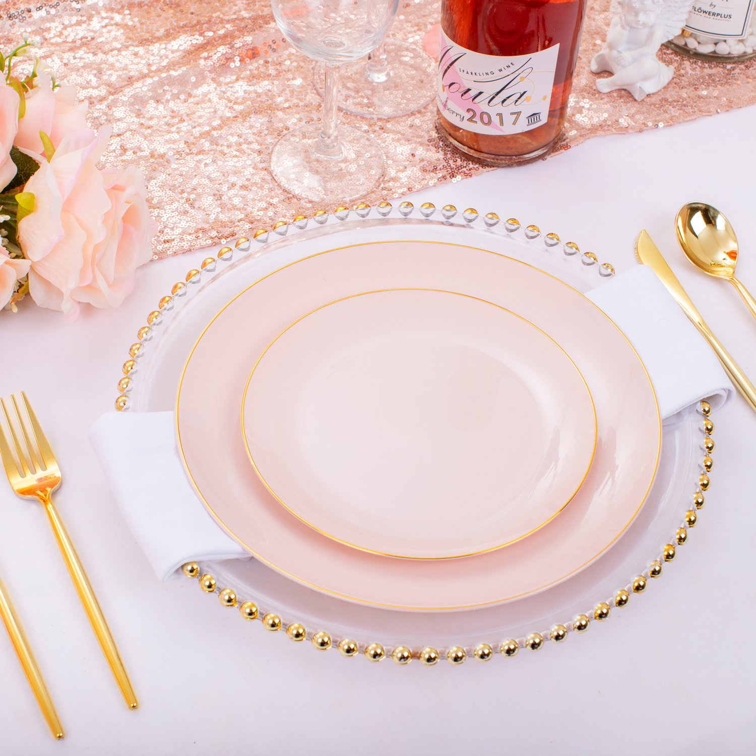 Pink plastic plates and cutlery set — product view 3